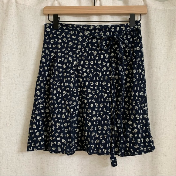 Brandy Melville Dresses & Skirts - Brandy Melville Navy Blue Floral Wrap Mini Skirt Viscose Multi Size Fits All